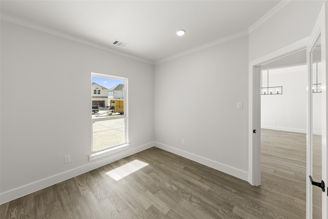 unfurnished room with crown molding and dark hardwood / wood-style floors