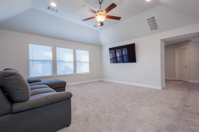 carpeted living room with lofted ceiling and ceiling fan