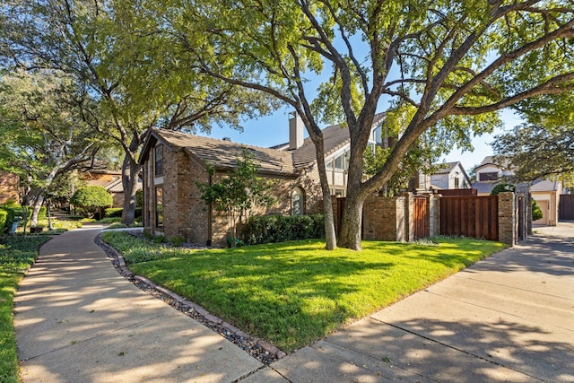 view of front of home with a front lawn