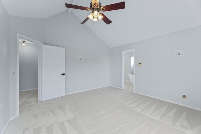 spare room featuring ceiling fan, high vaulted ceiling, beam ceiling, and light colored carpet