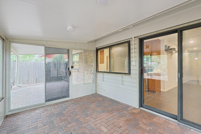 view of unfurnished sunroom