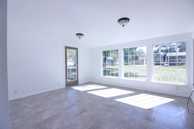 view of tiled spare room