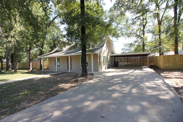 view of front of house featuring a carport