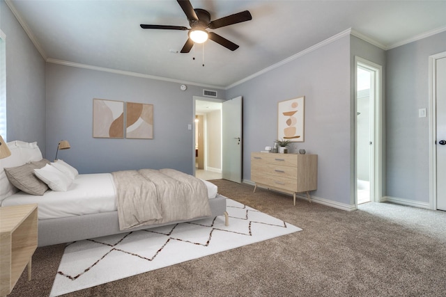 carpeted bedroom with ceiling fan and ornamental molding