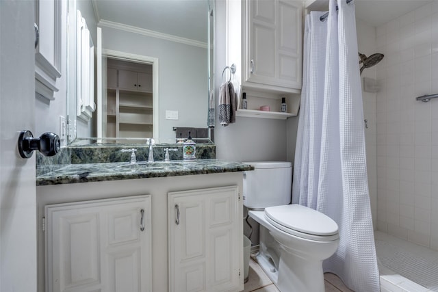 bathroom with vanity, a shower with curtain, crown molding, tile patterned flooring, and toilet