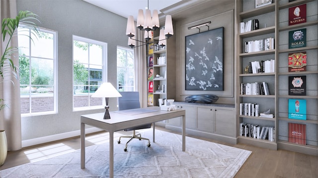 office area featuring light wood-type flooring and a notable chandelier