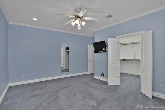 unfurnished bedroom featuring a closet, ornamental molding, carpet flooring, and ceiling fan