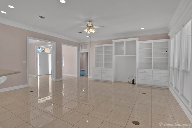 interior space featuring ornamental molding, light tile patterned floors, and ceiling fan