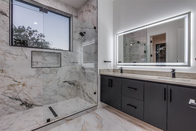 bathroom with a shower with door and vanity