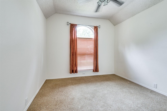 232 Touchdown Dr, Irving, TX 75063 - unfurnished room with lofted ceiling, carpet floors, a textured ceiling, and baseboards