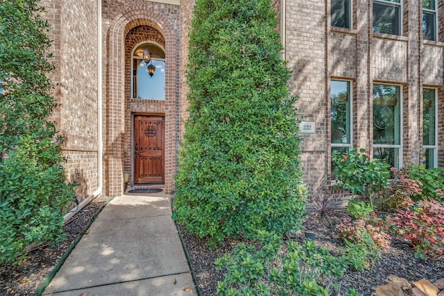 232 Touchdown Dr, Irving, TX 75063 - view of exterior entry featuring brick siding