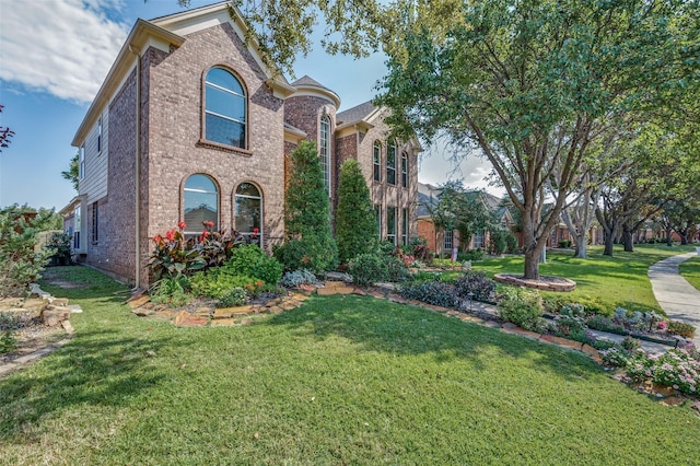232 Touchdown Dr, Irving, TX 75063 - view of front of home with brick siding and a front lawn