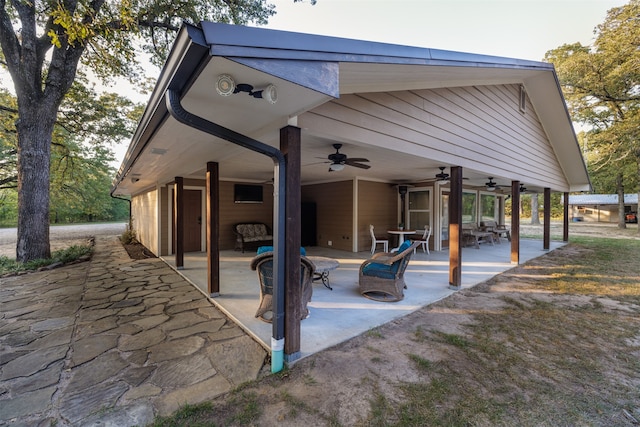 view of patio featuring ceiling fan