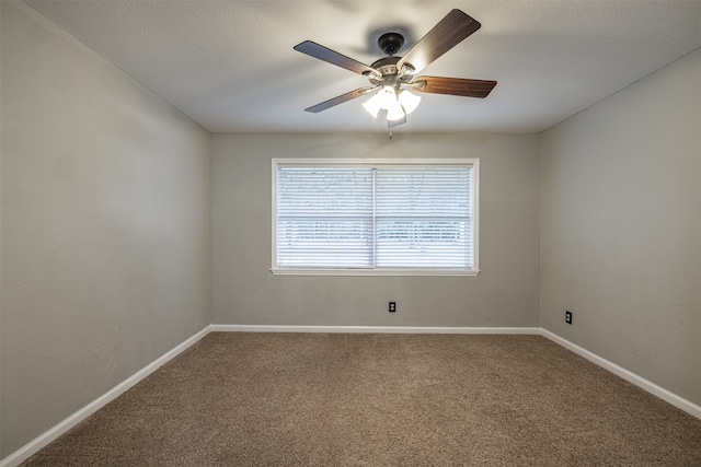 unfurnished room with a textured ceiling, carpet floors, and ceiling fan