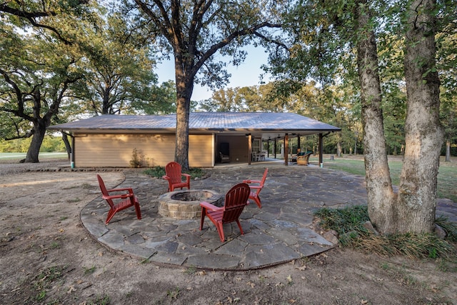 view of patio featuring an outdoor fire pit