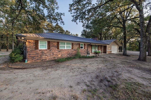 ranch-style home with a garage