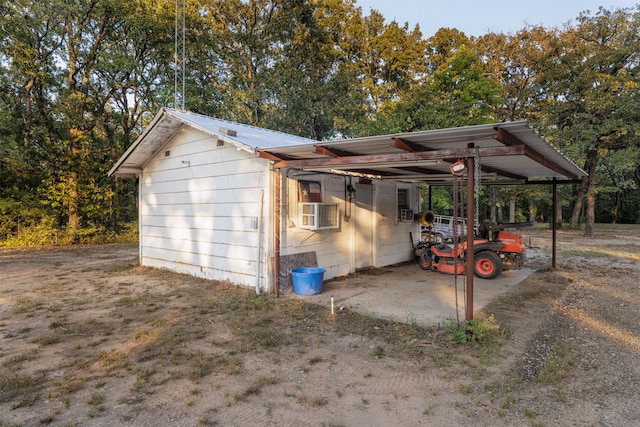 exterior space with a carport