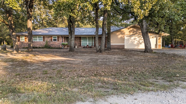 ranch-style home with a garage