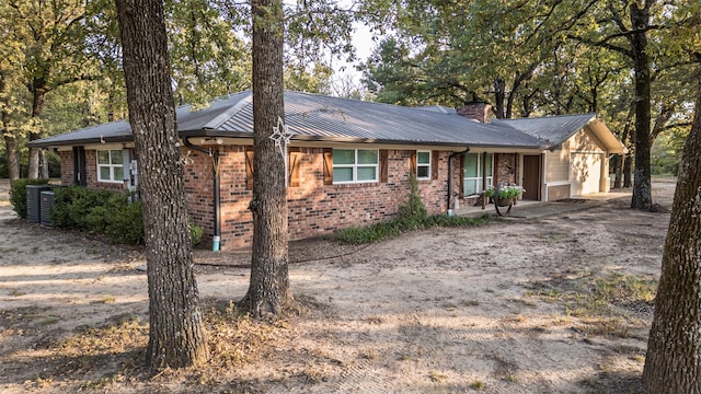 single story home with a garage