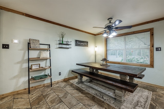 dining room featuring ceiling fan and crown molding