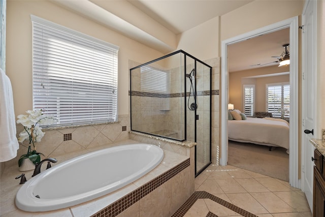 bathroom featuring tile patterned floors, plus walk in shower, and ceiling fan