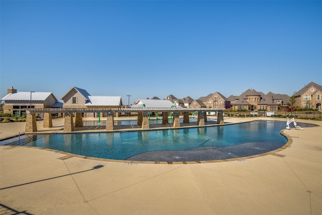 view of pool with a patio