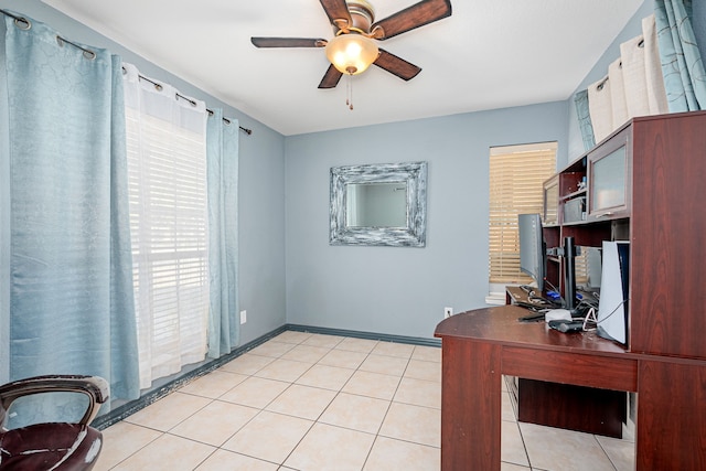 office with light tile patterned flooring and ceiling fan