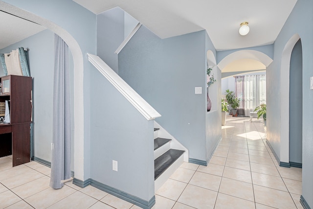 interior space with light tile patterned floors