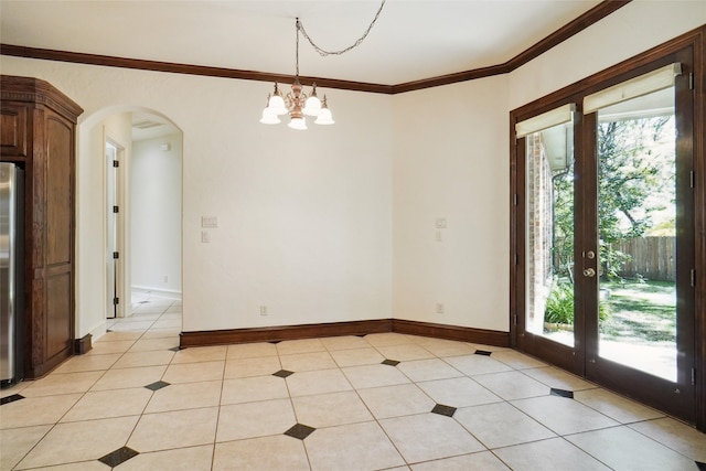 unfurnished dining area featuring crown molding, light tile patterned flooring, and a notable chandelier