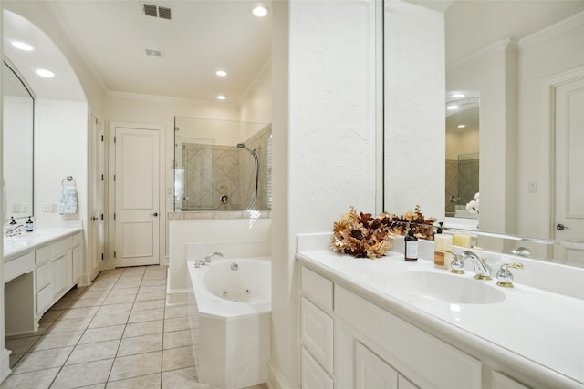 bathroom with tile patterned floors, crown molding, vanity, and shower with separate bathtub