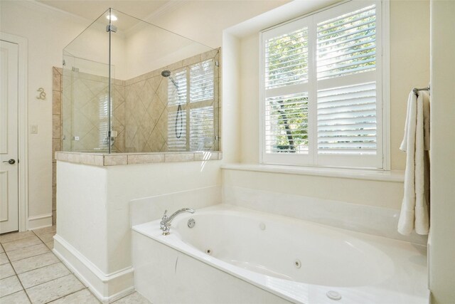 bathroom featuring tile patterned floors, a wealth of natural light, crown molding, and plus walk in shower