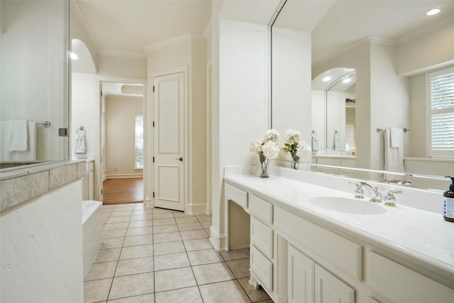 bathroom featuring tile patterned floors, vanity, and ornamental molding