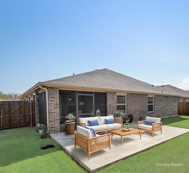 view of front of property with a garage and a front lawn