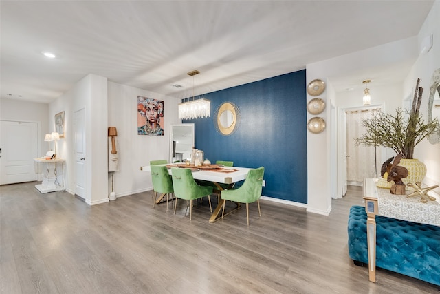 dining area featuring wood-type flooring