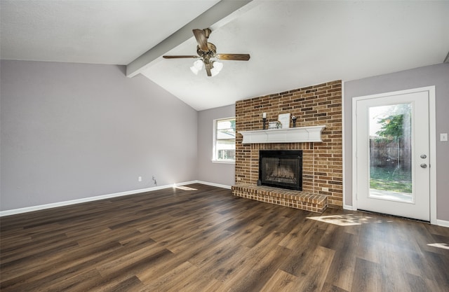 unfurnished living room featuring a fireplace, vaulted ceiling with beams, ceiling fan, and dark wood-type flooring