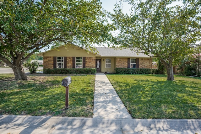 ranch-style house with a front yard