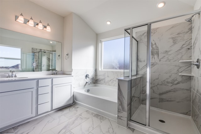 bathroom featuring separate shower and tub, plenty of natural light, and lofted ceiling