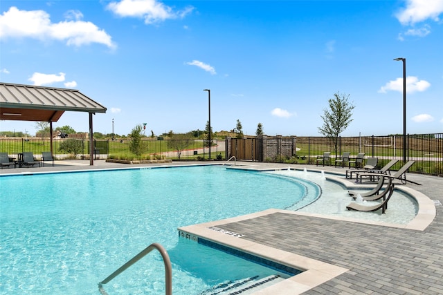 view of pool featuring a patio area