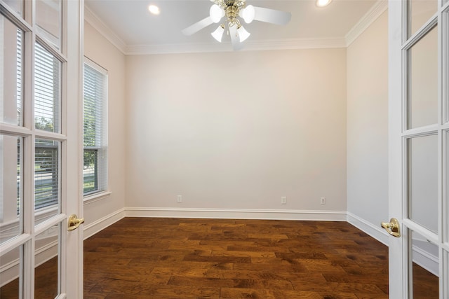 empty room featuring french doors, dark hardwood / wood-style floors, and ornamental molding