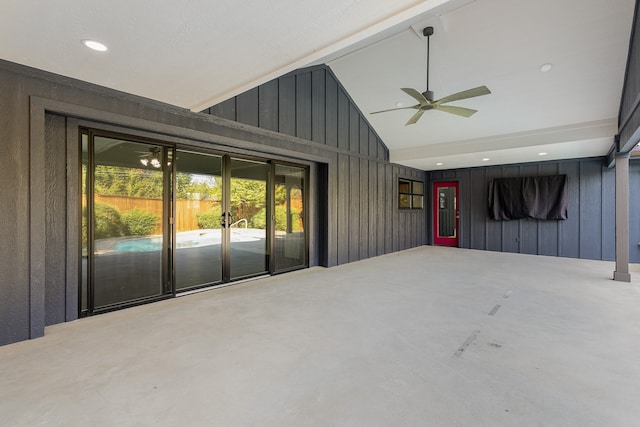 interior space with ceiling fan