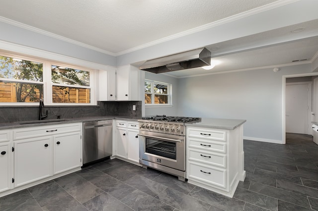 kitchen with stainless steel appliances, sink, extractor fan, kitchen peninsula, and white cabinetry