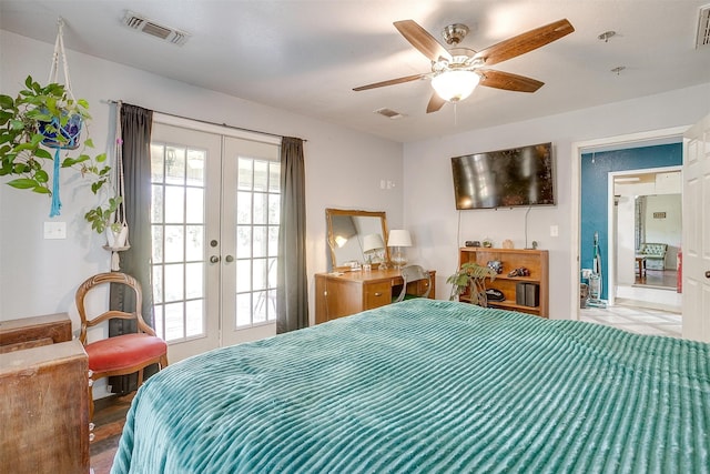 bedroom featuring french doors, hardwood / wood-style floors, and ceiling fan