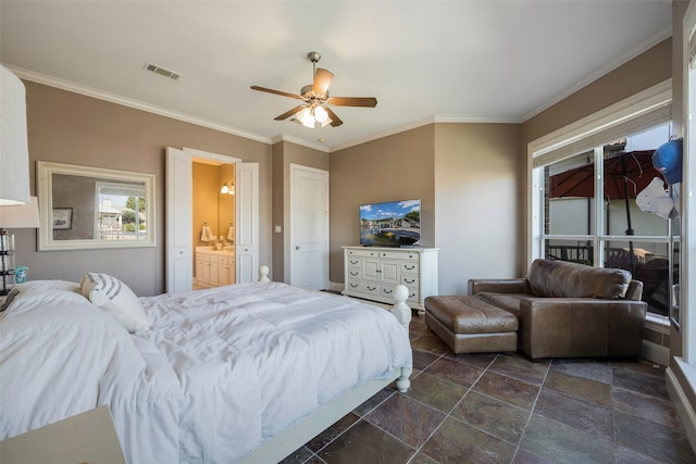 bedroom with ceiling fan, ornamental molding, and ensuite bath