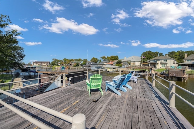 dock area with a water view