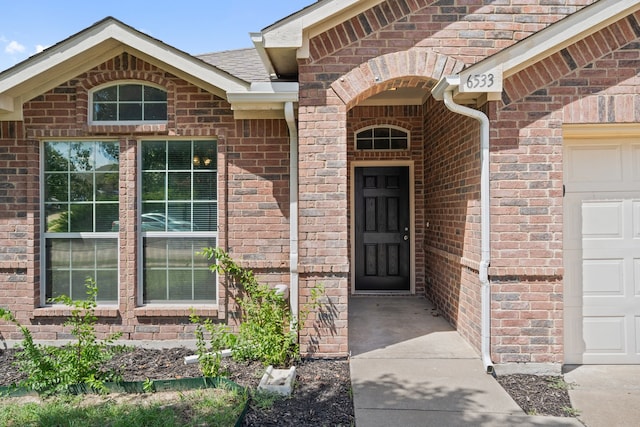 entrance to property with a garage