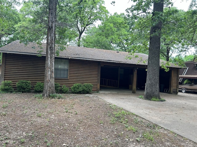 view of log-style house