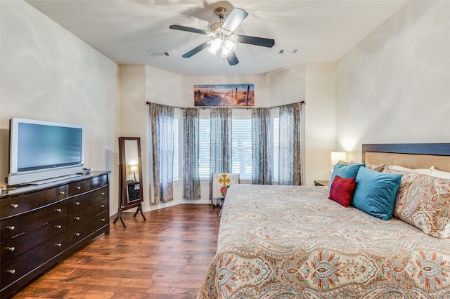 bedroom featuring ceiling fan and dark wood-type flooring