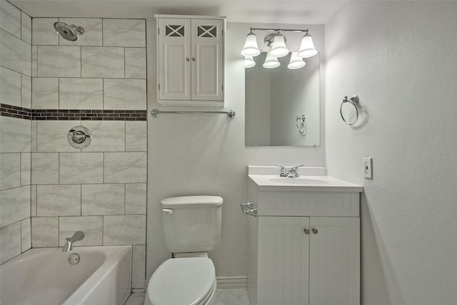 full bathroom featuring vanity, tiled shower / bath combo, and toilet