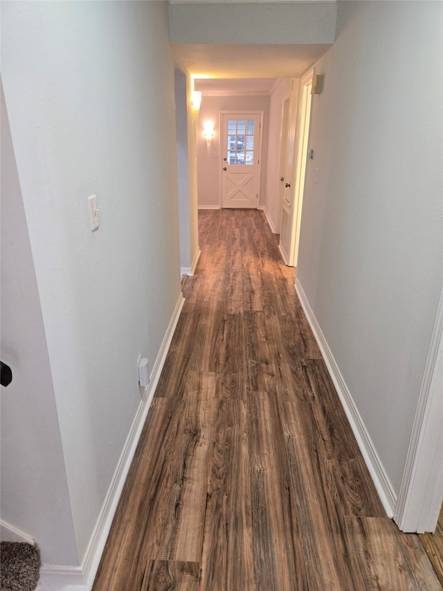 hallway with dark wood-type flooring