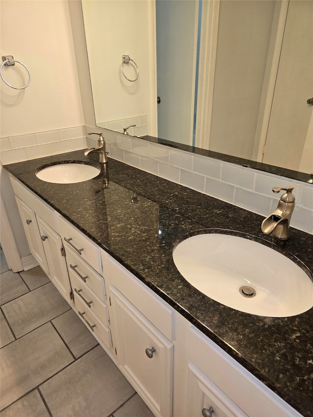 bathroom with vanity and tile patterned floors